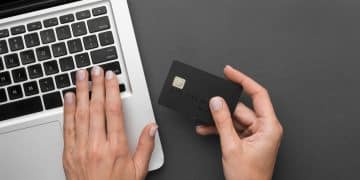 A person holding a Bilt Mastercard credit card.